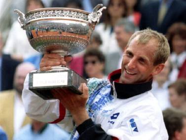 Thomas Muster of Austria holds the cup after his victory in the French tennis open at Roland Garros stadium June 11.Muster defeated Michael Chang of the USA 7-5,6-2,6-4
