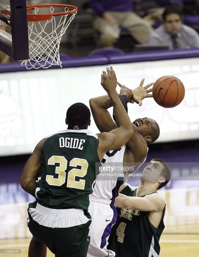 Texas Christian&apos;s Greg Hill (25) is fouled by Colorado State&apos;s Andy Ogide (32) as his teammate Pierce Hornung (4) defends during NCAA men&apos;s basketball action at Daniel-Meyer Coliseum in Fort Worth, Texas, on Saturday, February 27, 2010. Texas Christian defeated Colorado State, 73-67. (Brandon Wade/Fort Worth Star-Telegram/MCT)