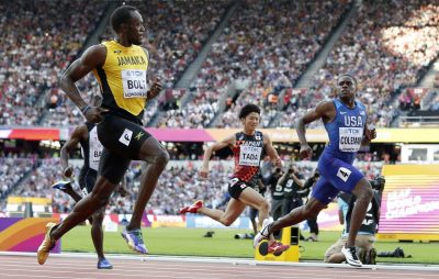 Jamaica's Usain Bolt, Japan's Shuhei Tada and United States' Christian Coleman, from left, cross the line of a men's 100-meter semifinal during the World Athletics Championships in London Saturday, Aug. 5, 2017. (AP Photo/Matt Dunham)